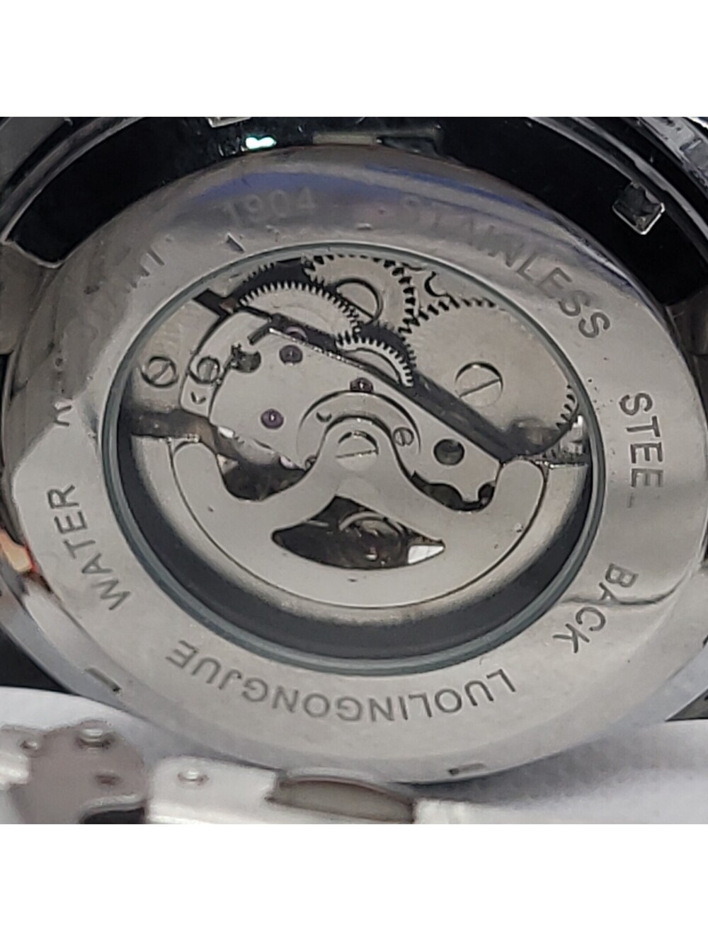 408 ONOLA Men's Automatic Skeleton Dial Tachymeter Silver Steel Bracelet Watch - Picture 6 of 8